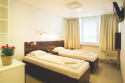 One of the lovely patient rooms where a companion can stay with the patient during their time in the hospital