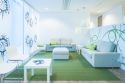 The relaxing patient lounge where patients wait before treatment