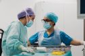 The nurses prepare everything for the surgery.